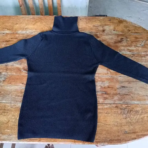 Pull col roulé